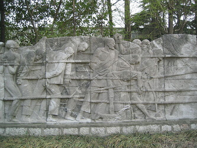 800px-Nanjing_massacre_low_relief1.jpg